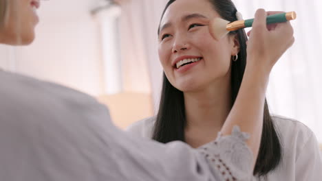 asian woman, makeup and makeover using brush