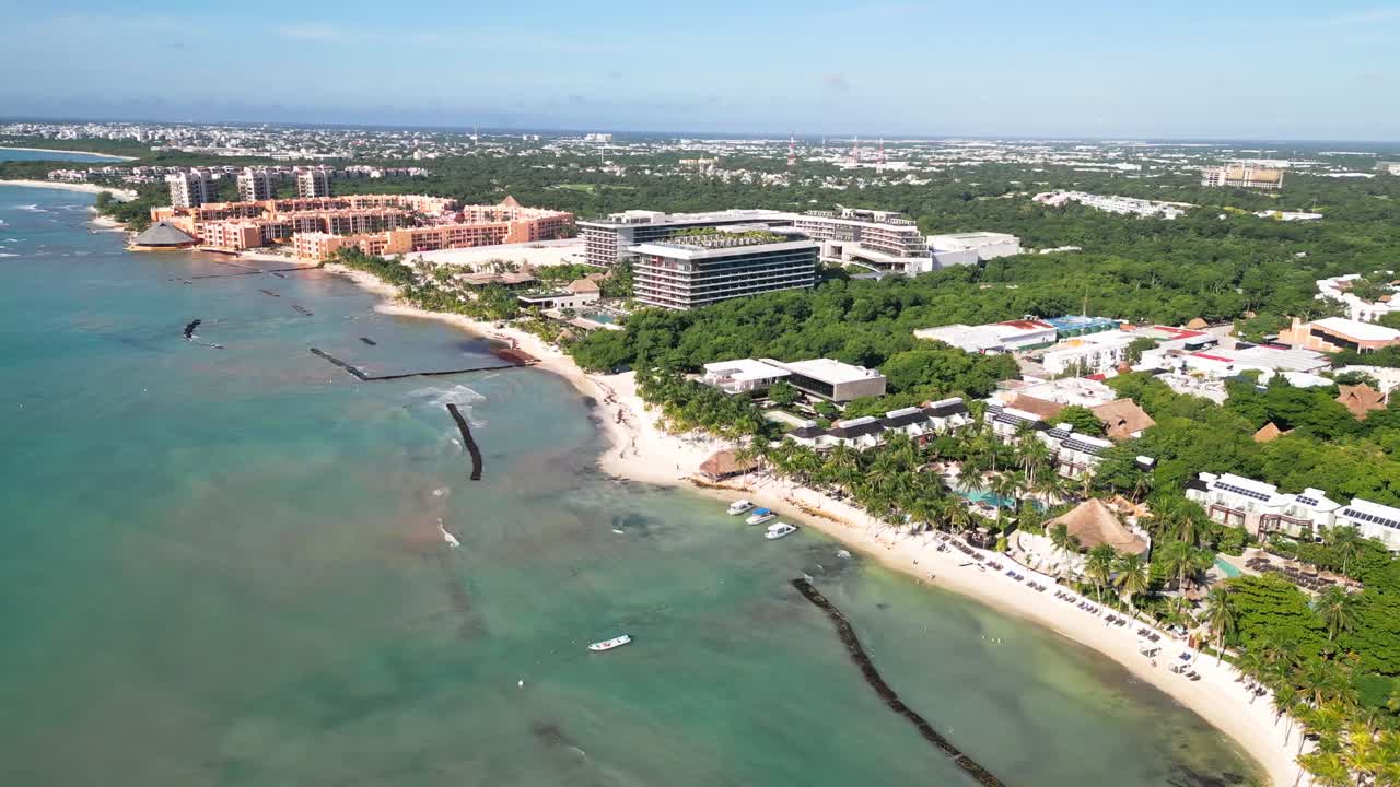 Aerial view of Playa Xcalacoco, Mexico, showing tranquil coastal resort