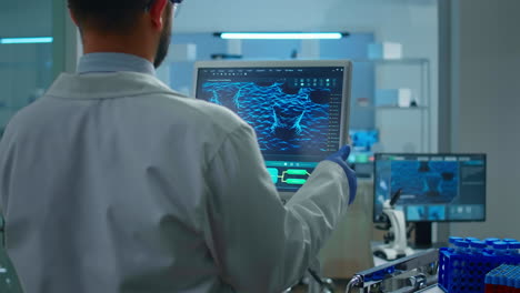 scientist working in laboratory analysing test trial vaccine