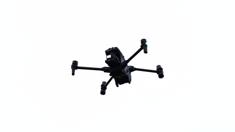 industrial drone silhouette hover in bright overexposed sky, czechia