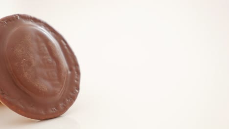 chocolate biscuit on white reflective background  4k