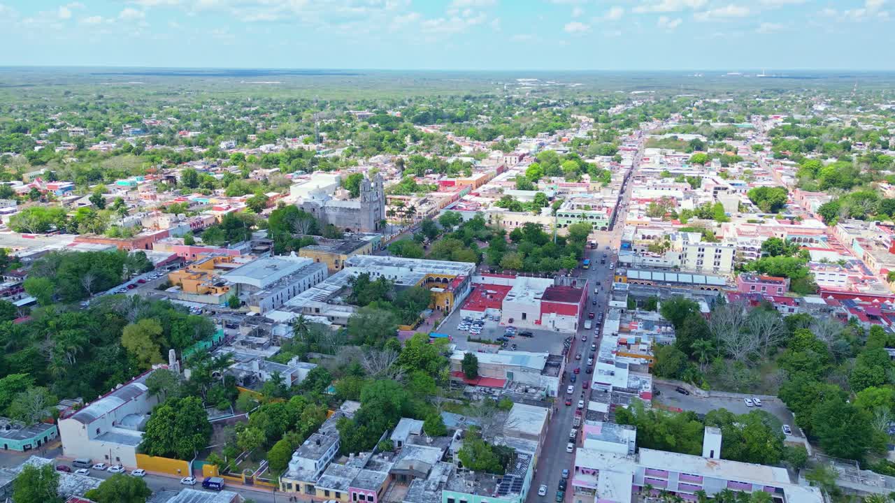 Vibrant aerial view of Valladolid, showcasing the San Servasio Church and surrounding streets