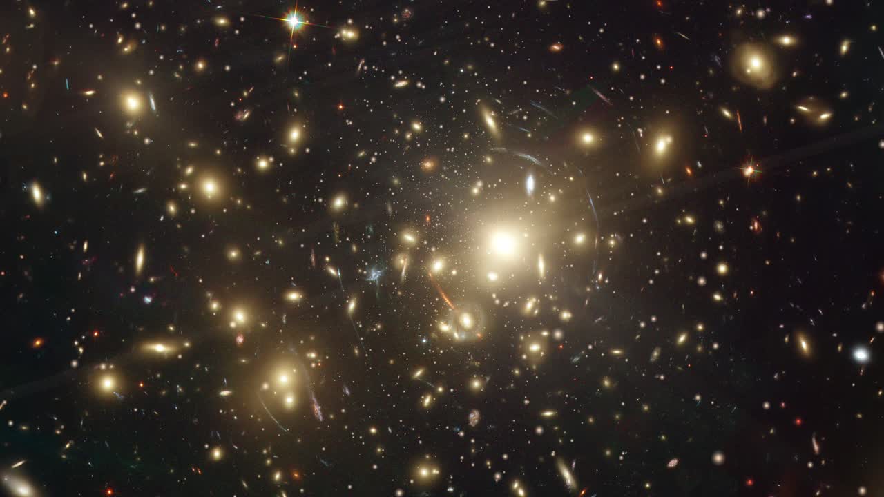 Wide shot of Abell 2218, a stunning galaxy cluster, bends light from distant galaxies through gravitational lensing, creating a mesmerizing deep-space view.