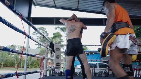 Muay Thai Training and Sparring Session in an Outdoor Boxing Ring