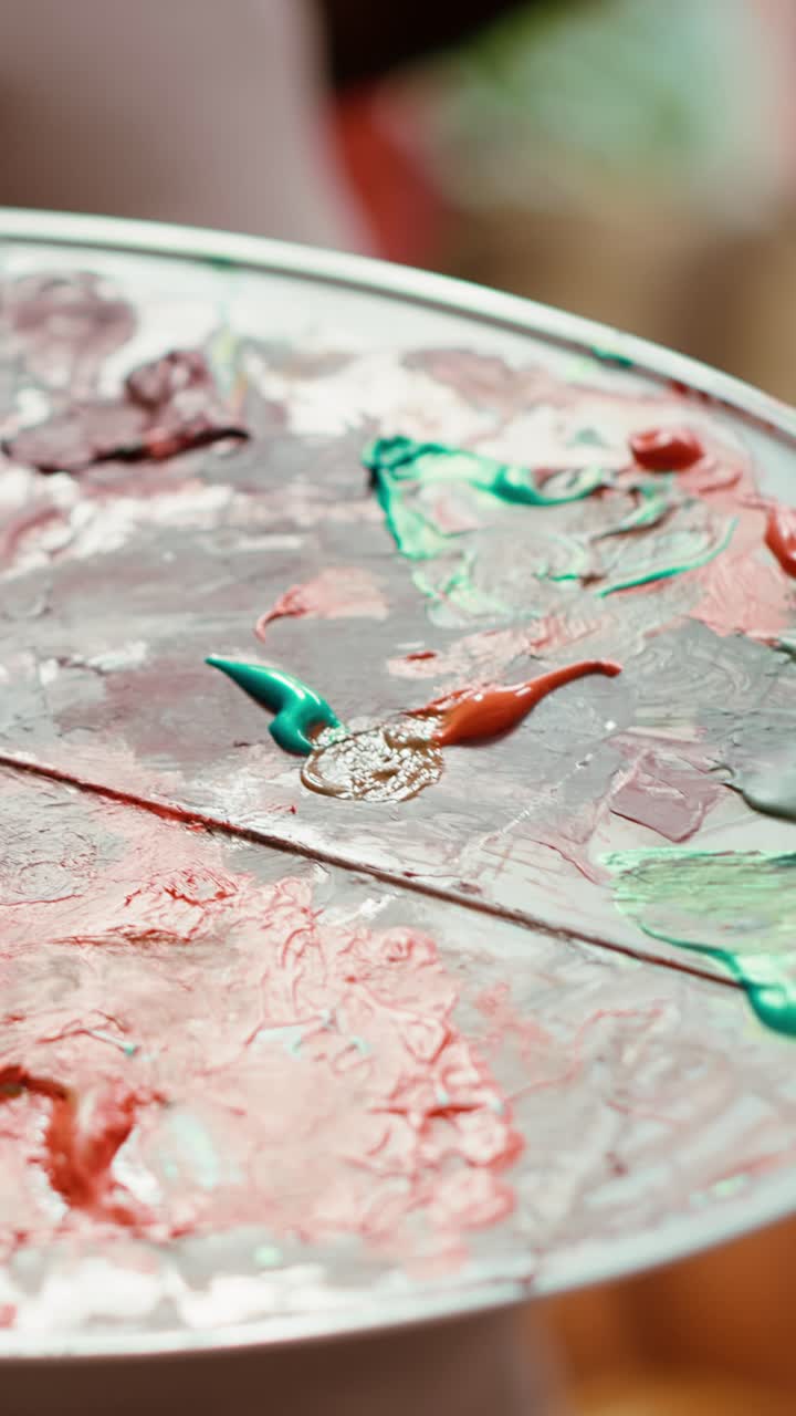 Colorful Paint Textures on an Artist's Palette