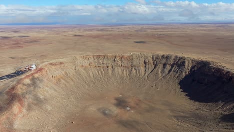 4k aerial of meteor crater or barringer crater in arizona, usa