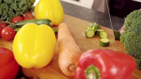 feminine hands slicing vegetables