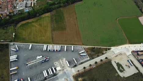 aerial view of a truck stop and agricultural fields
