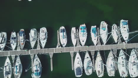 Aerial-top-down-view-of-marina-a-dock---yachts-and-small-boats