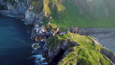 epic revealing drone shot of kinbane castle in county antrim, northern ireland