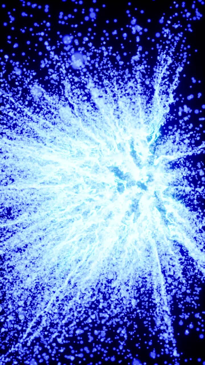 Abstract blue particle explosion