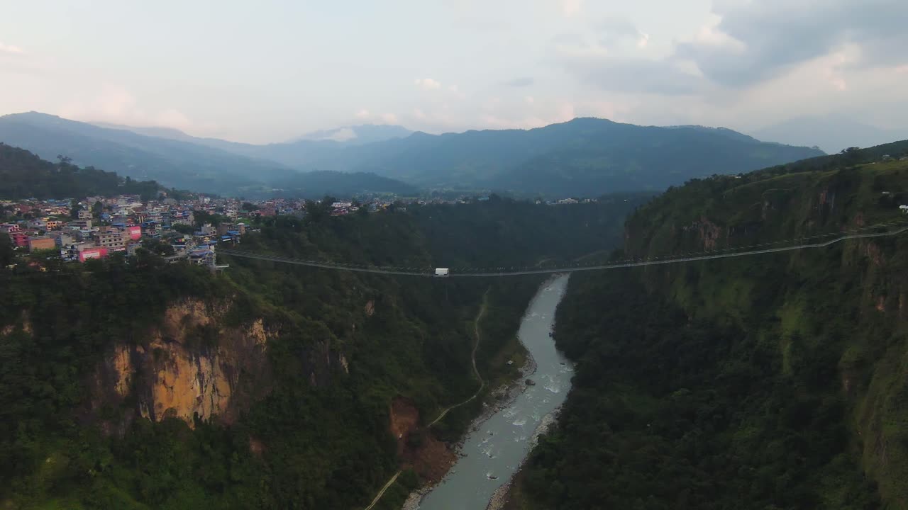 Kushma bungee jump off footbridge in Pokhara Nepal