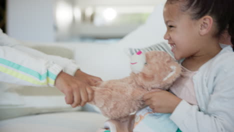 happy, children and teddy bear fight on sofa by