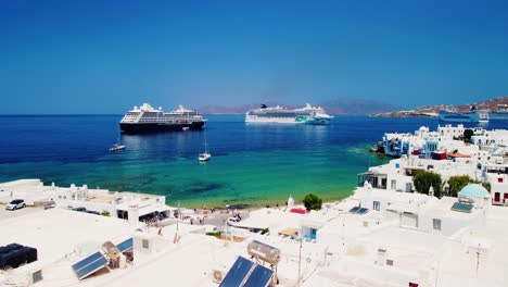 Aerial-View-Of-Old-Town-in-Mykonos-Greece-during-summer-Residence-Hotel-Yacht-Boats-Sea-Vacations-Trip-Ship-cruise