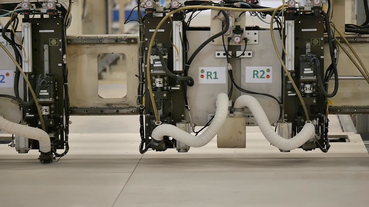 Robot Working in Heavy Metal Factory