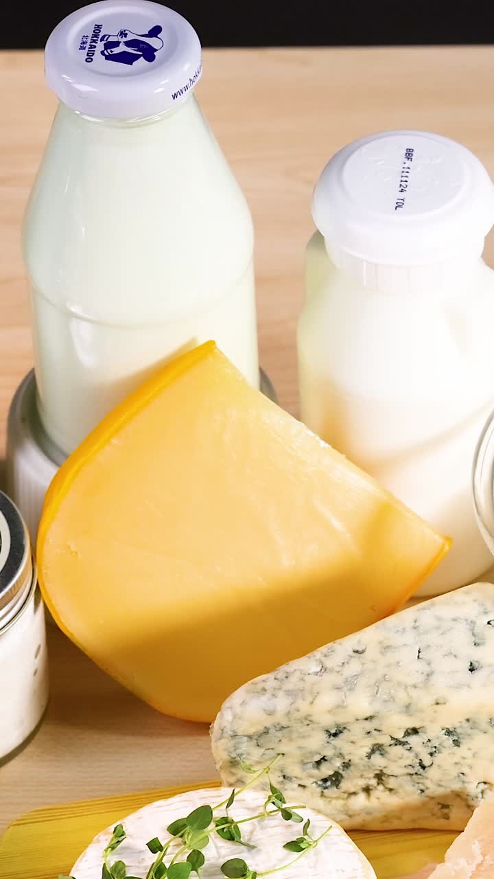 Assorted dairy products on a wooden background