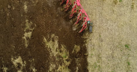 Agricultural-Tractor-Plowing-Field