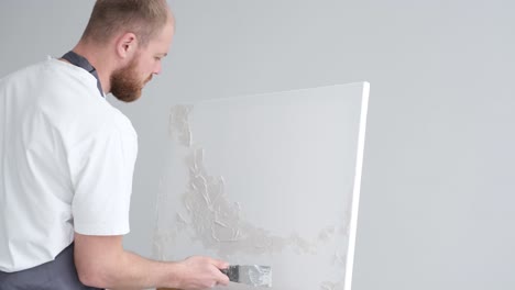 artists paint pictures in the studio. creative artists have designed a colorful picture painted