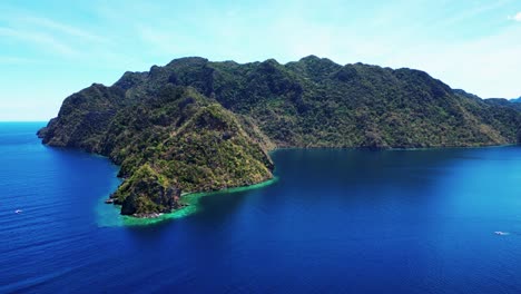 gorgeous aerial drone in paradise town of coron with mountain view