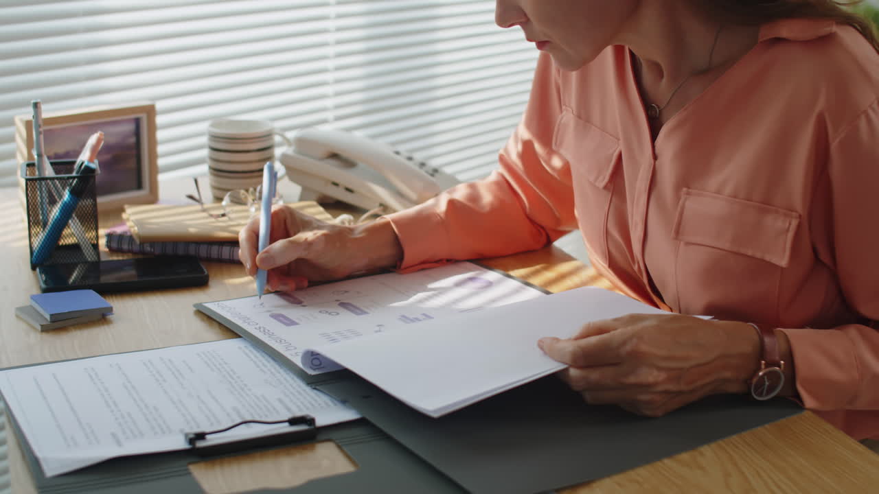 Female Project Manager Checking Working Report