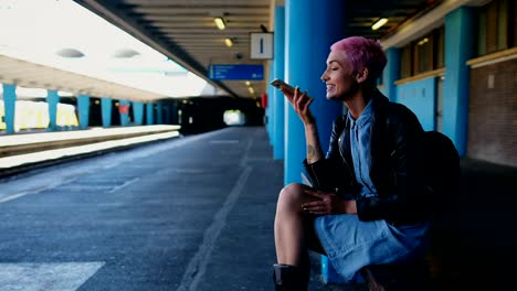 pink hair woman talking on mobile phone 4k