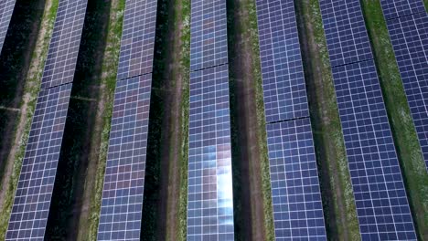 Solar-panel-field-close-up-aerial-view-in-sunny-daylight