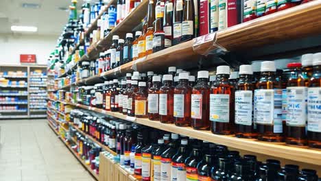 shelves of various bottled products in a store