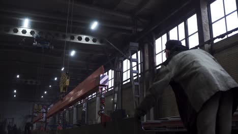 factory worker operating machinery