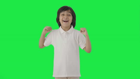 Happy-Indian-boy-dancing-and-enjoying-Green-screen