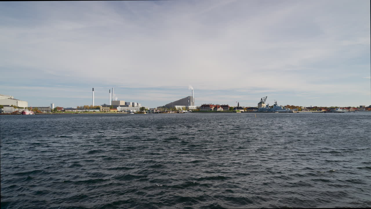Distant view of the Copenhill artificial ski slope on the roof of an energy plant in Copenhagen, Denmark