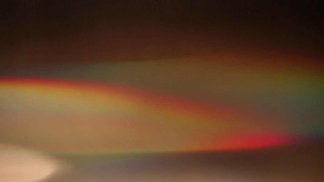 Bright White Light Flash and Rainbow Lens Flare Transition