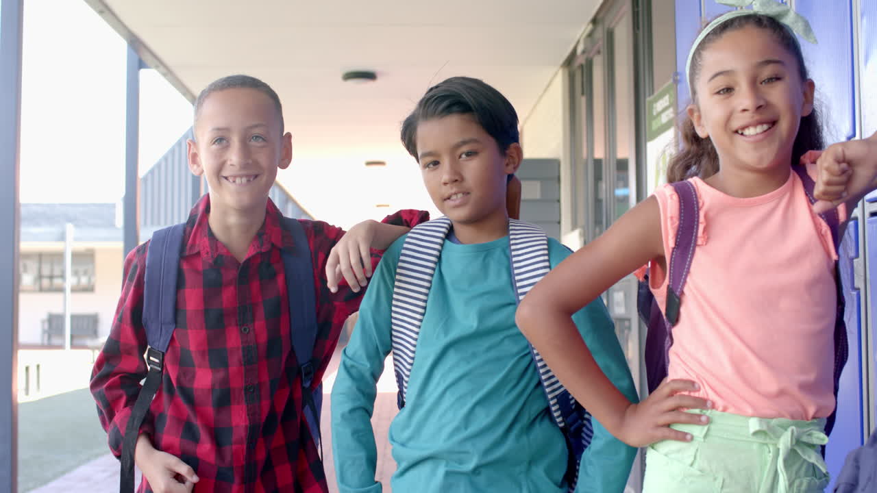 Diverse students pose confidently at school
