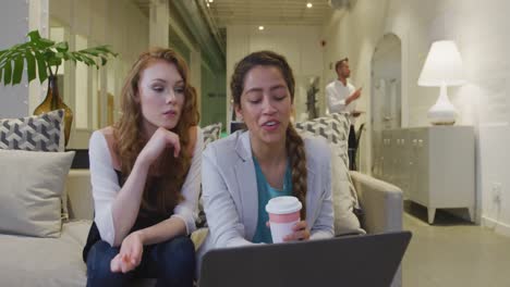 businesswomen working together in modern office