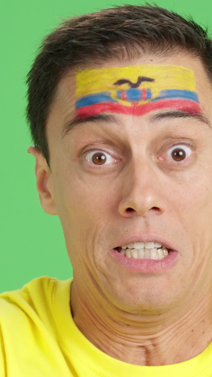 Man with ecuadorian national flag upset with a referee