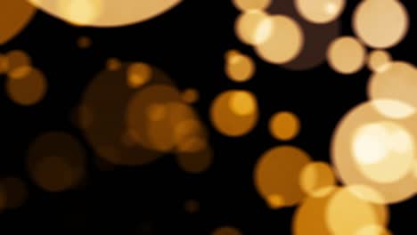 abstract blurred bokeh holiday background. colorful big golden bokeh on black background. christmas and new year decoration. magic circles. yellow circles photo effect.