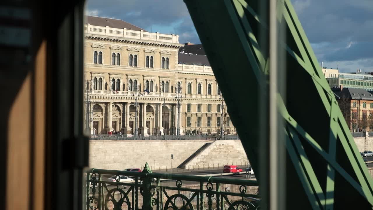 Budapest Cityscape: View of a Historical Building from a Bridge