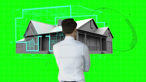 arquitecto diseñando una casa en la interfaz verde