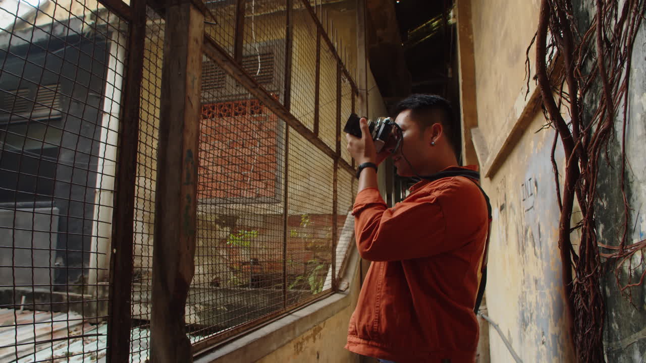 Photographer Taking Pictures of Abandoned Places