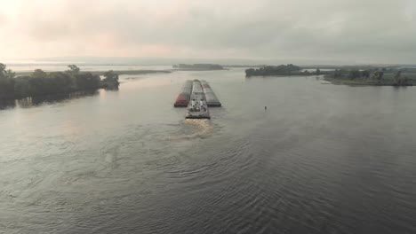 drone shot of a houseboat on the mississippi