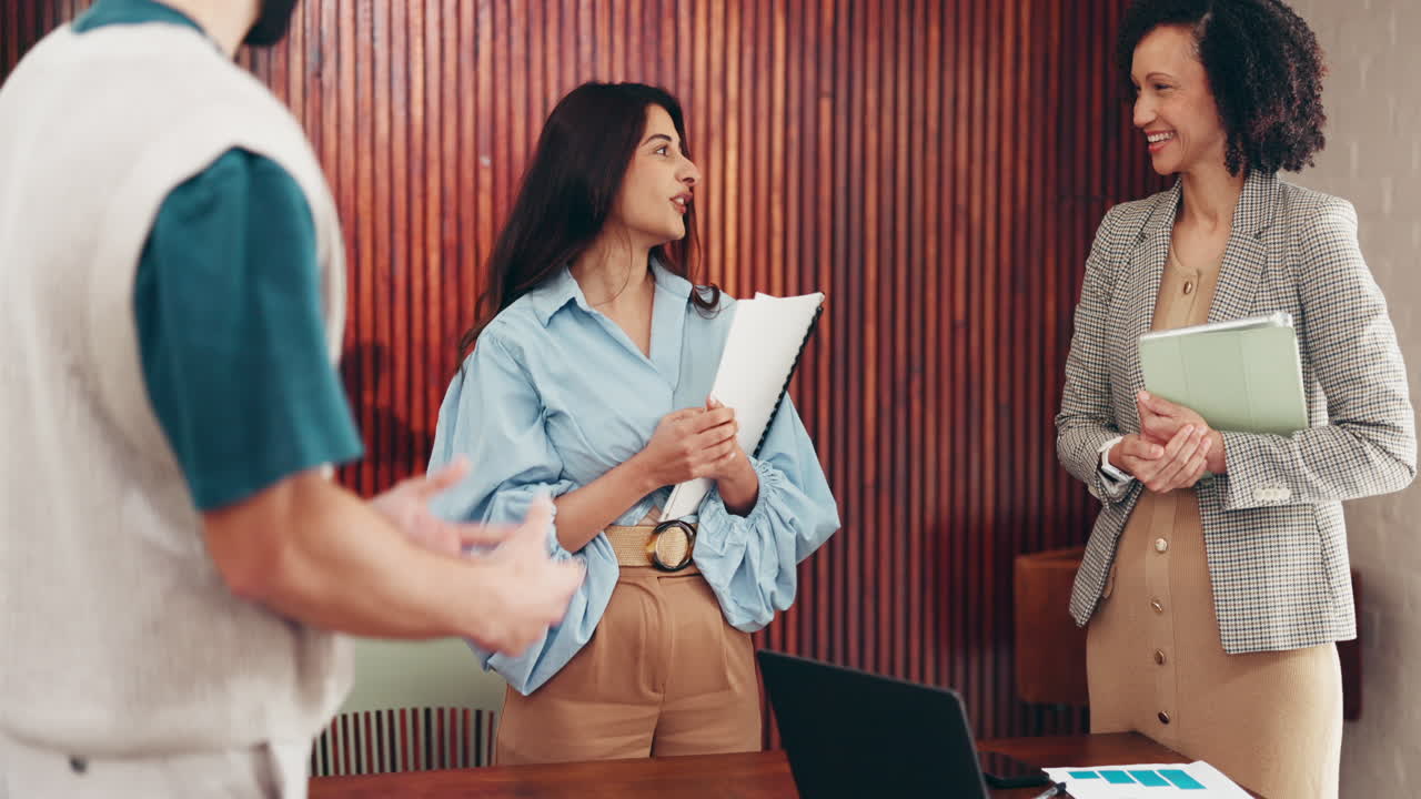 Business team celebrating success and collaboration in the office