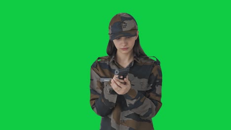 indian woman army officer inspection handgun green screen