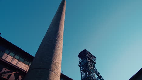 brick chimney and mining tower at the metallurgical furnace