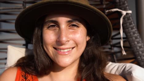 portrait of brunette young woman smiling to camera