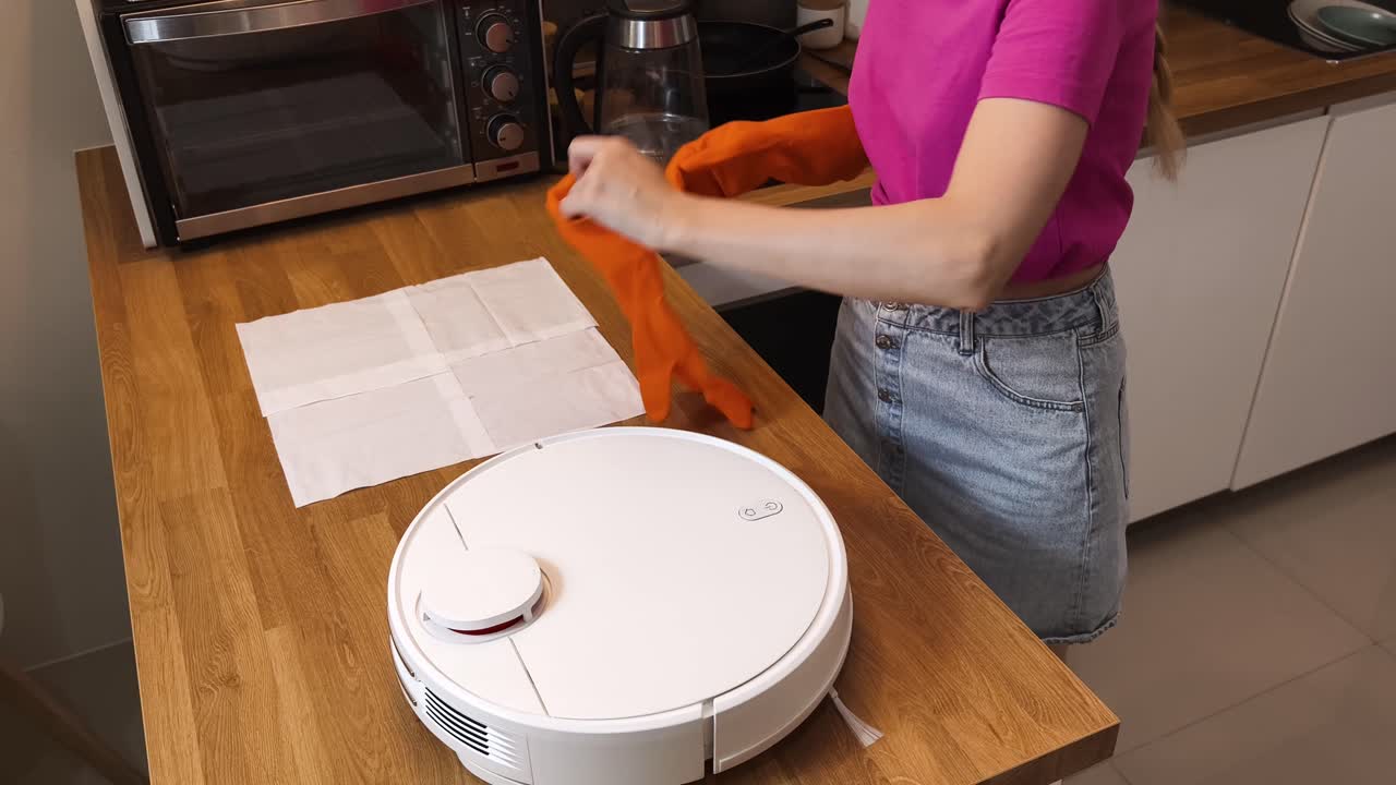 Woman Cleaning with Robot Vacuum