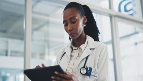 Doctor,-woman-and-tablet-in-clinic-for-healthcare