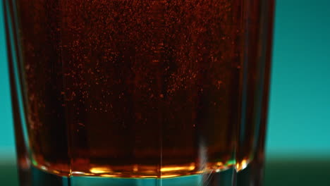 close-up of a glass of fizzy drink