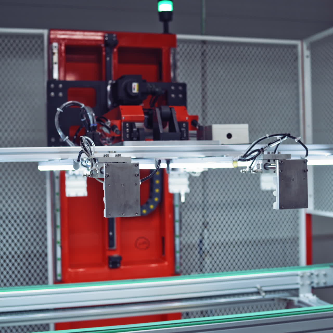 Industrial robot working in factory,Conveyor Tracking Controler of robotic hand. Green energy concept. Special equipment closeup.