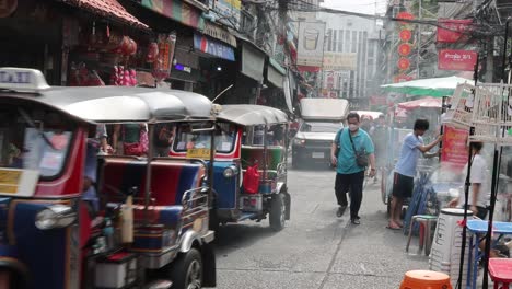 vibrant urban market scene with pedestrians and vehicles