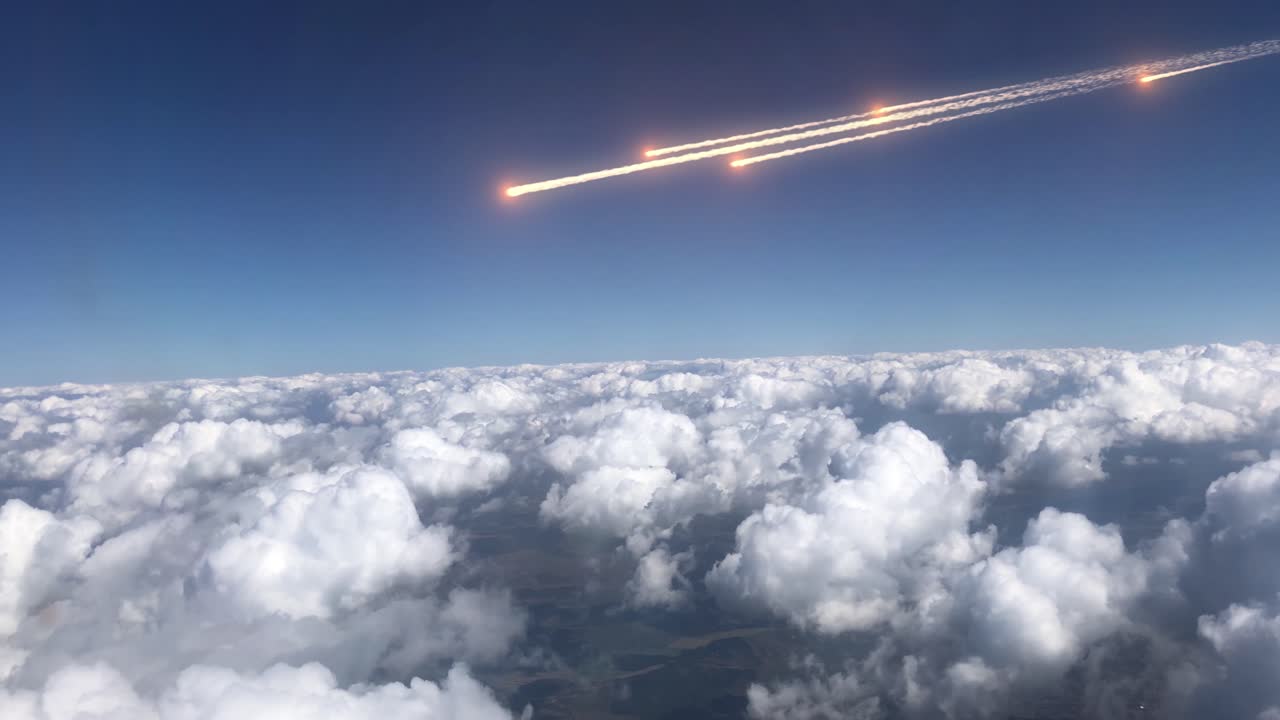 Meteors Streaking Across a Cloudy Sky