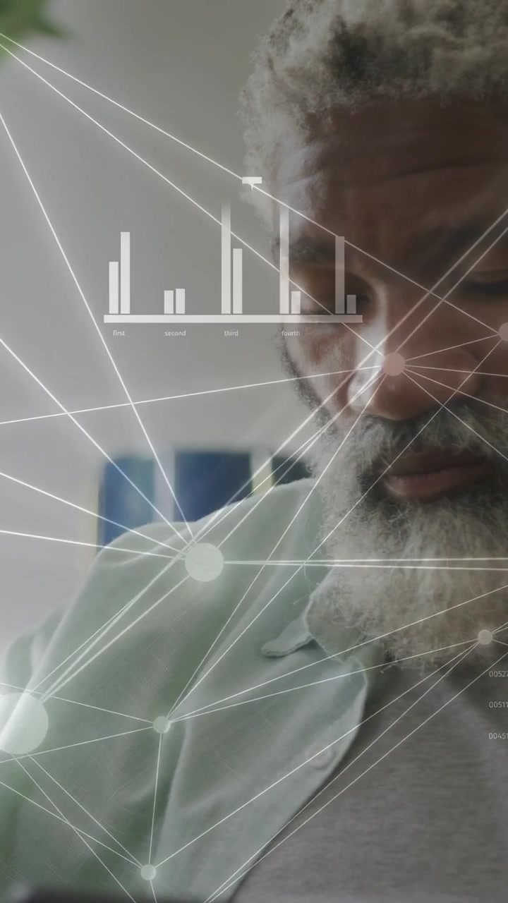 Vertical video: Senior man glancing at offframe device, analyzing finance charts with AR nodes
